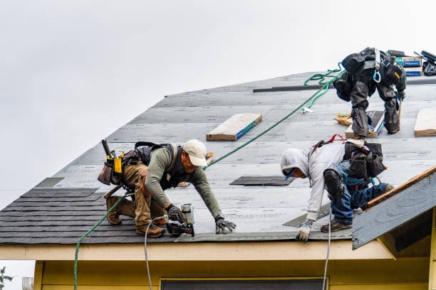 Professional Emergency Roof Repair technician working in Springs, NY
